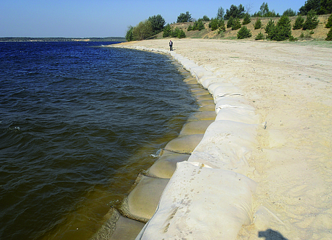 Riverbank slope stabilised using SoilTain Bags