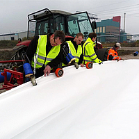 Employees use Basetrac® Duo geocomposite