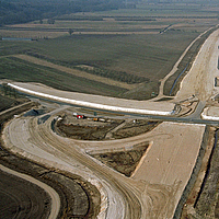 Bird's eye view of freeway interchange construction site shows use of Stabilenka geogrid