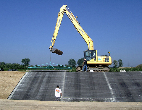 Geosynthetic clay liner used in dyke rehabilitation.