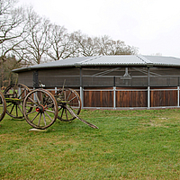 Round horse arena with installed Lubratec wind protection system