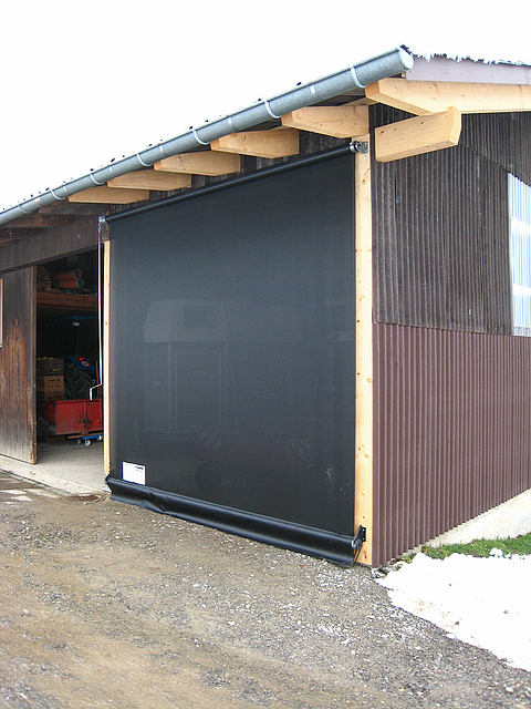 Roller shutter system for easy wind and weather protection of the warehouse stock