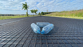 Road with HaTelit C eco reinforcement and recycled plastic bottles