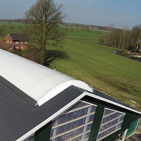 Roof of a stable building with Lubratec light ridge for natural lighting