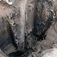 A filled Ringtrac® column partially buried in the ground