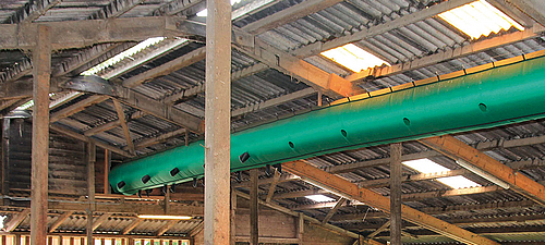 Lubratec Tube Air Ventilation hose on the ceiling of an old stable building
